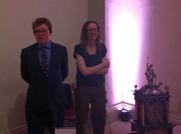 British Museum Curators Oliver Cooke and Laura Turner, standing vigilant by the clock.