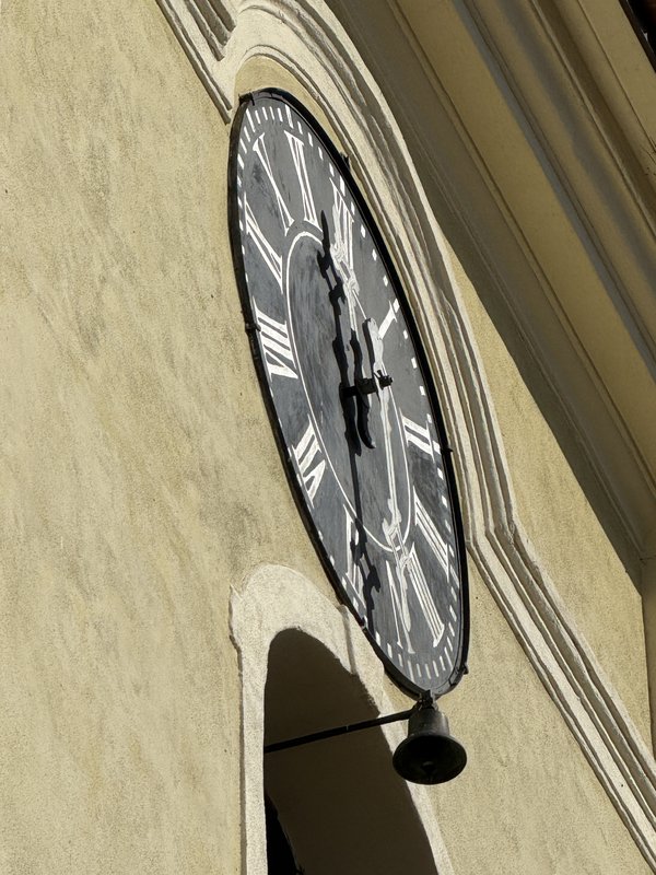 A small clappered bell that can be swung side to side. Șelimbăr Evangelical Church.