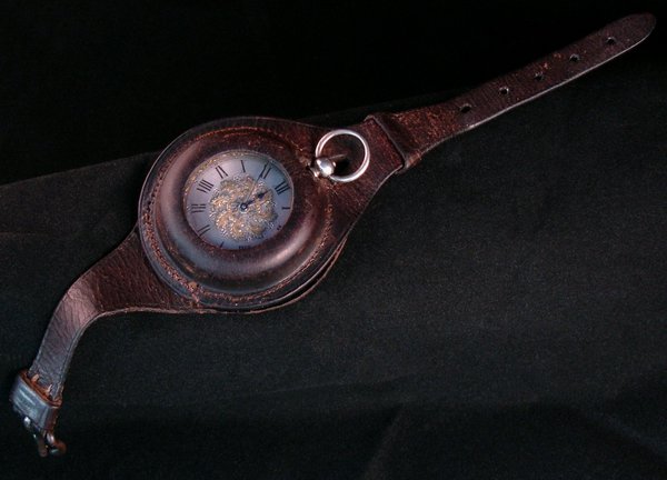 English silver fob watch c.1880 in an early C20th leather cup strap